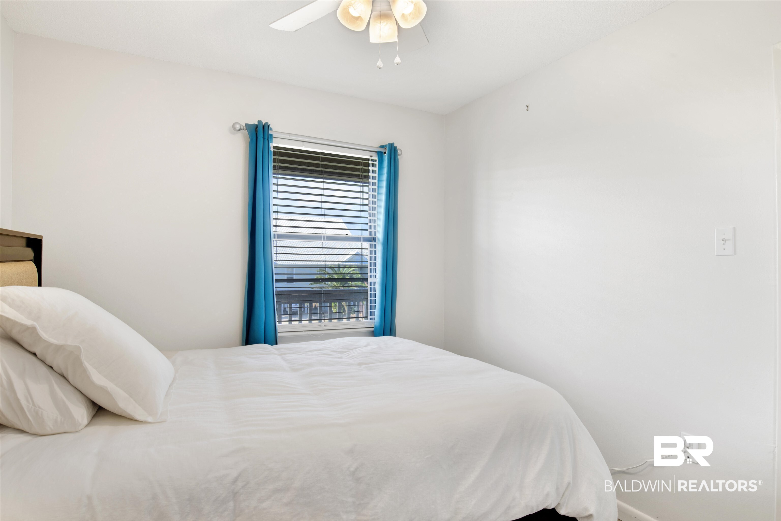 26913 Marina Road, Unit 213 Orange Beach, AL 36561 - Photo 17 of 30 Bedroom featuring ceiling fan