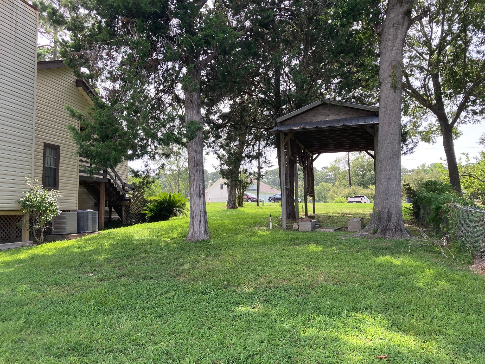 554 Harbor Drive Onalaska, TX 77360 - Photo 12 of 32 a view of a house with a yard