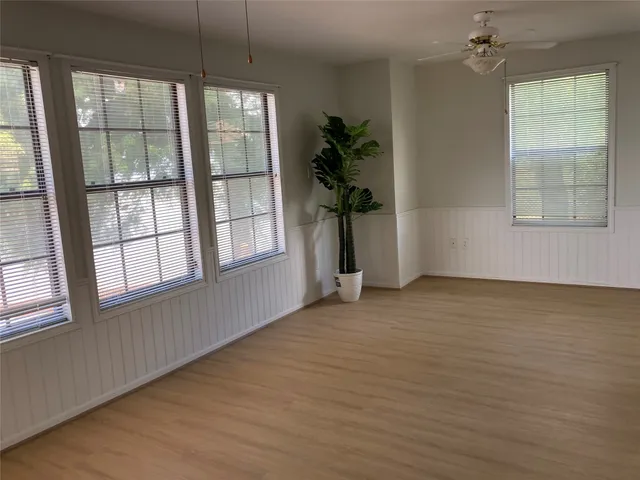 a view of a kitchen with furniture and a kitchen counter top space