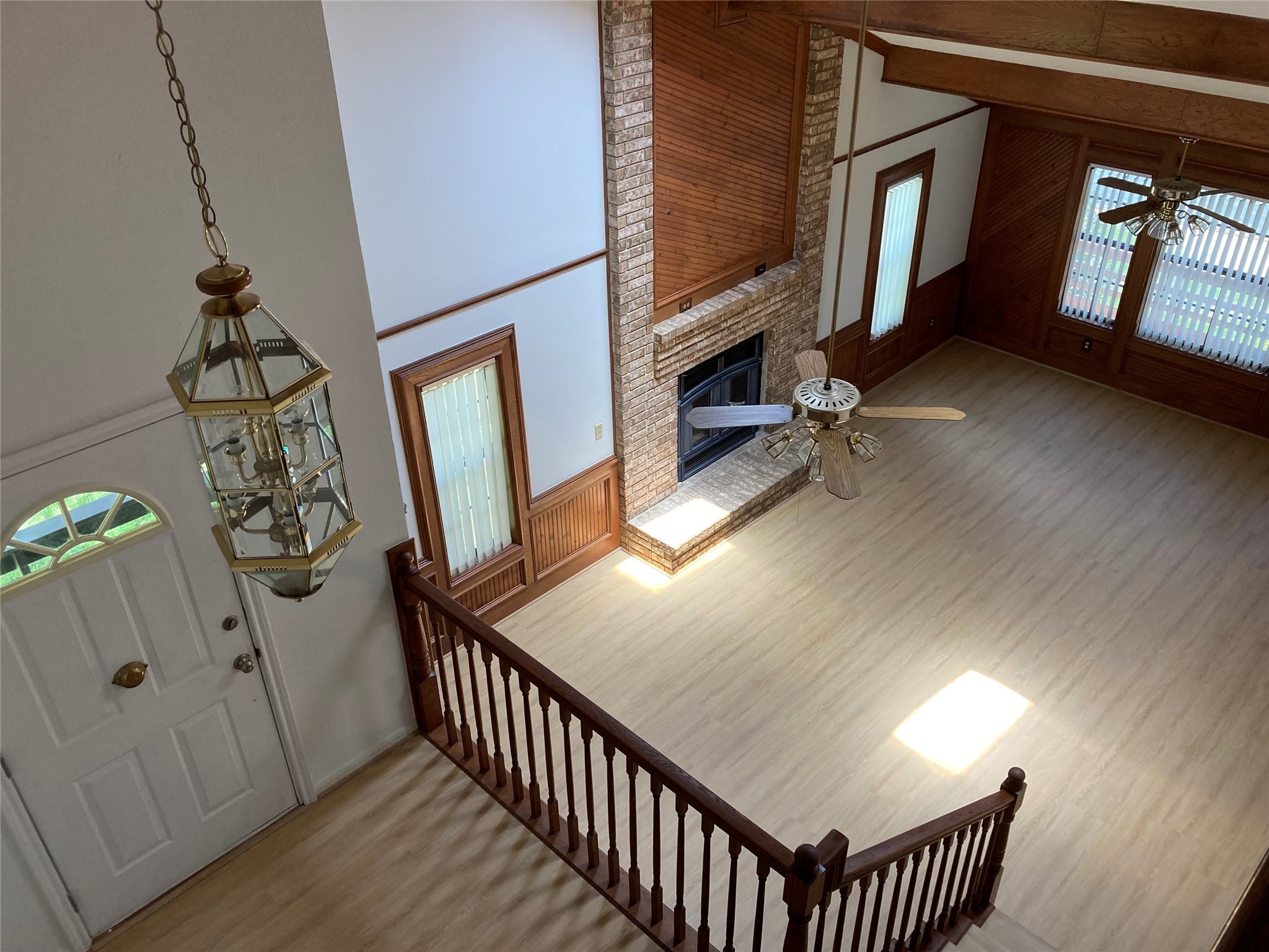 554 Harbor Drive Onalaska, TX 77360 - Photo 29 of 32 a view of a livingroom with wooden floor and stairs