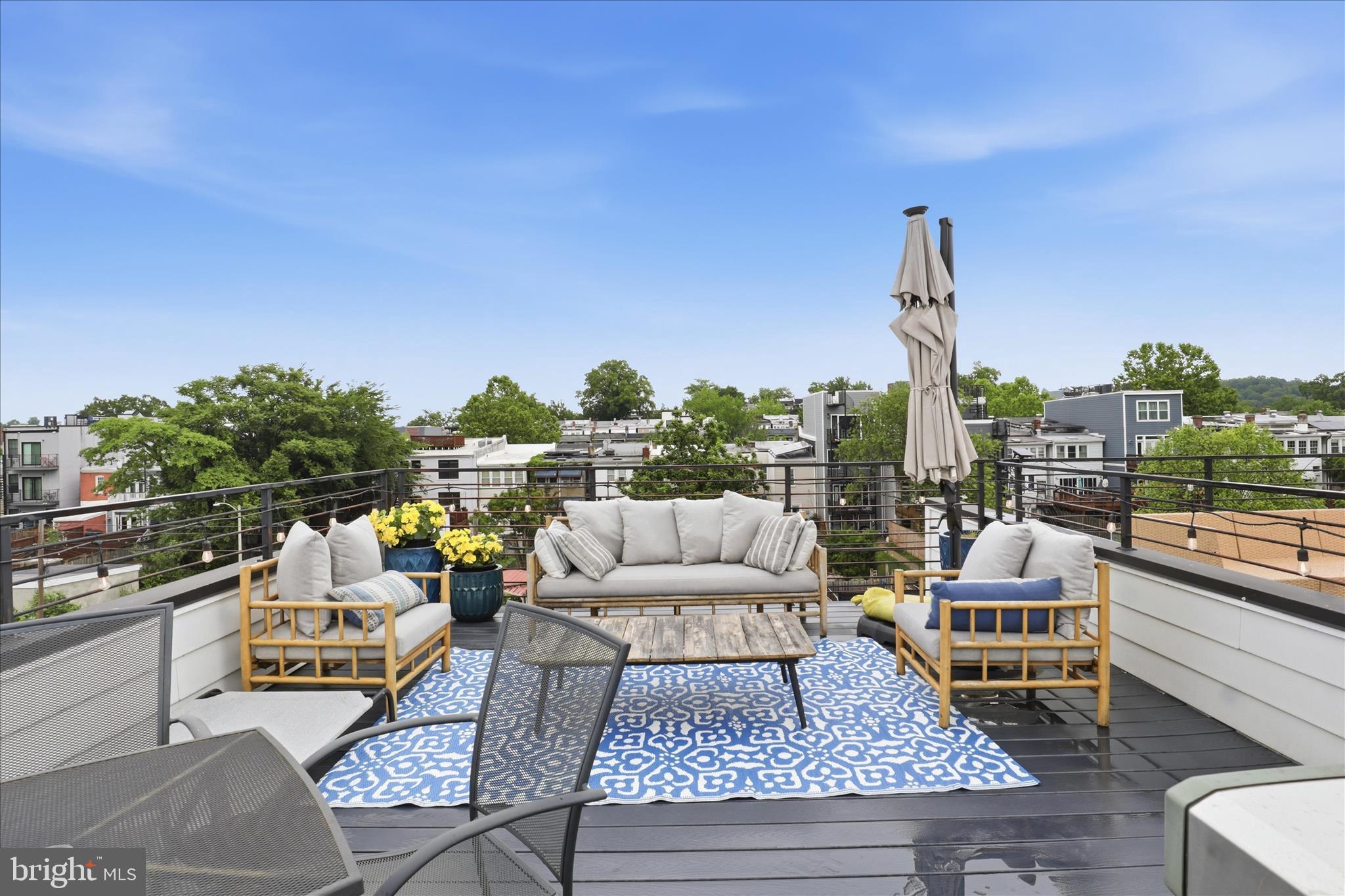 1222 Neal Street Northeast, Unit 3 Washington, DC 20002 - Photo 33 of 38 a outdoor living space with furniture and city view