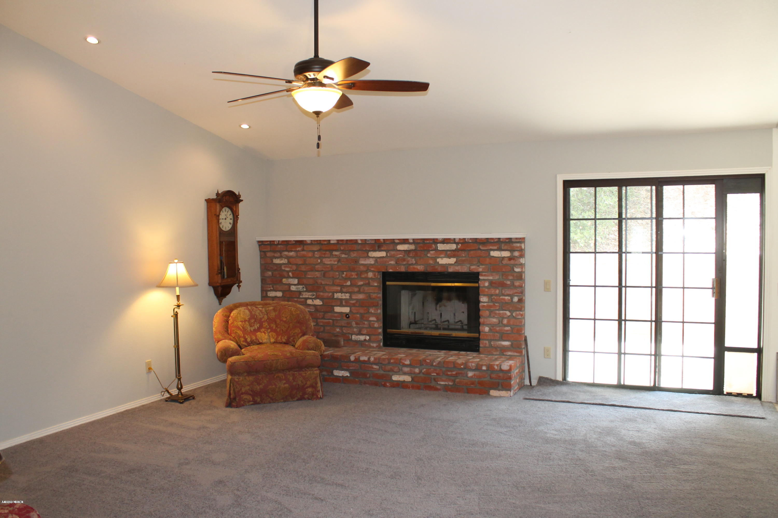 1553 Aalborg Way Solvang, CA 93463 - Photo 11 of 12 a living room with furniture and a fireplace