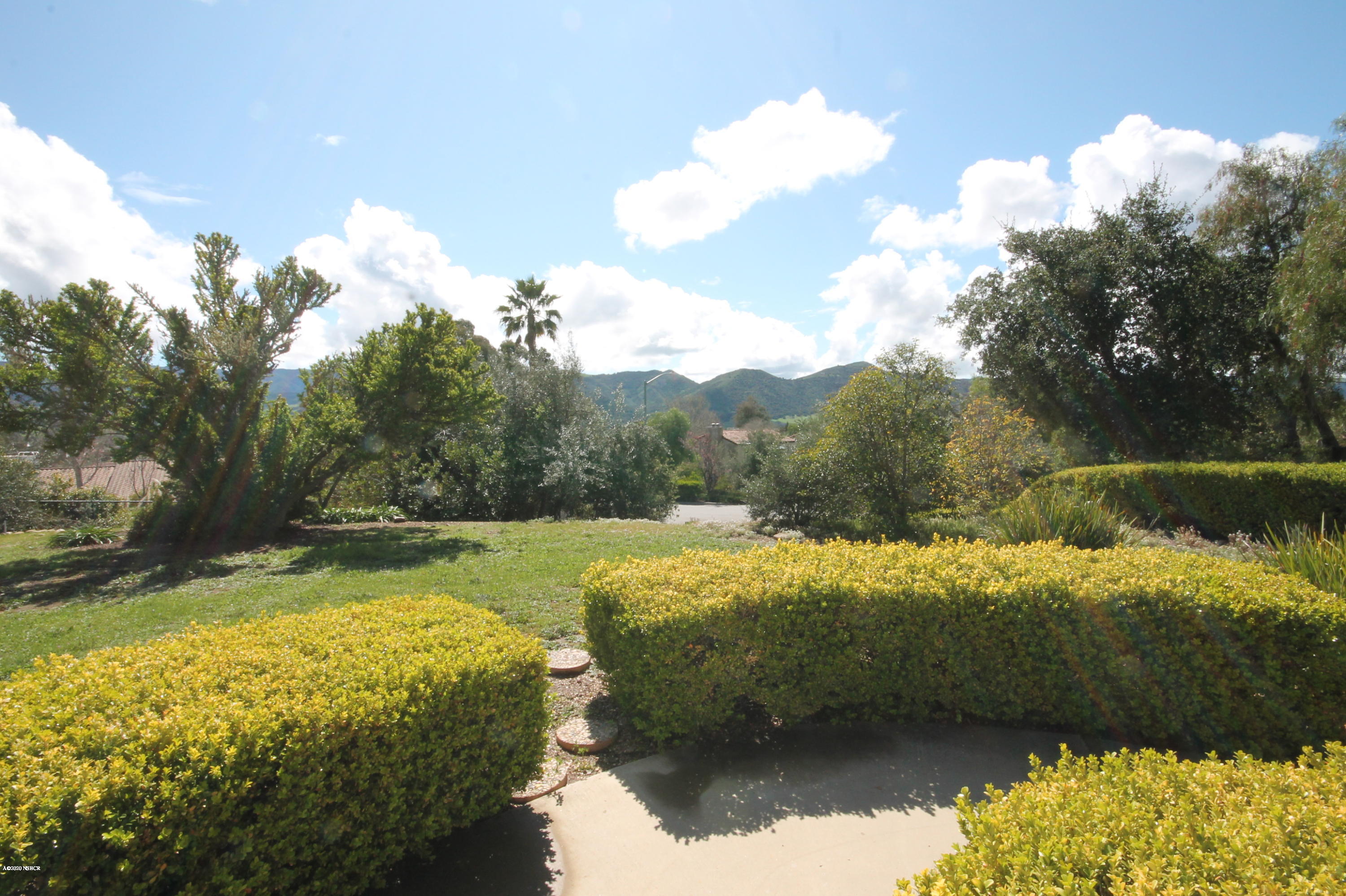 1553 Aalborg Way Solvang, CA 93463 - Photo 6 of 12 a view of a lake with a yard