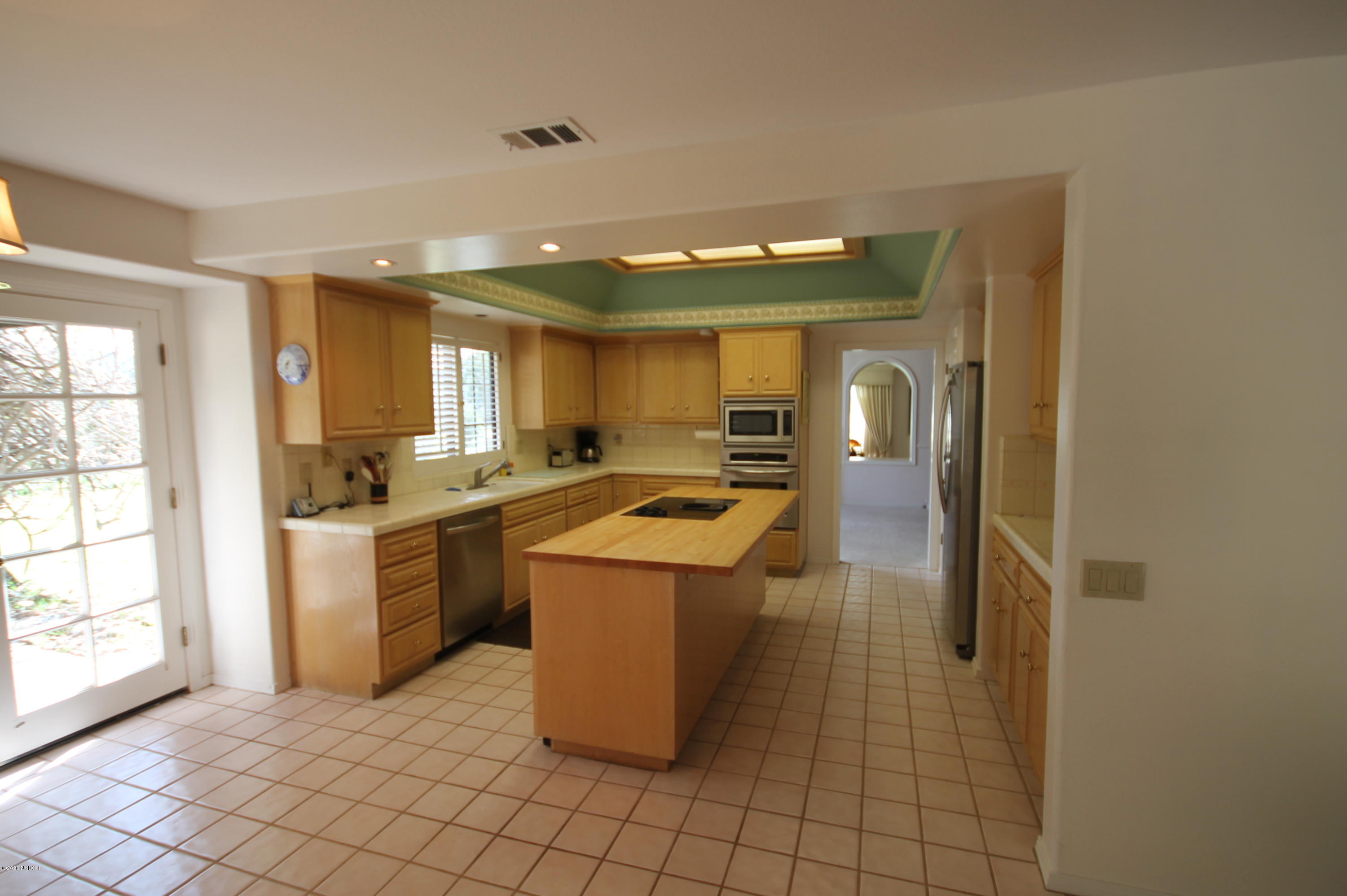 1553 Aalborg Way Solvang, CA 93463 - Photo 8 of 12 a kitchen with a sink cabinets and window