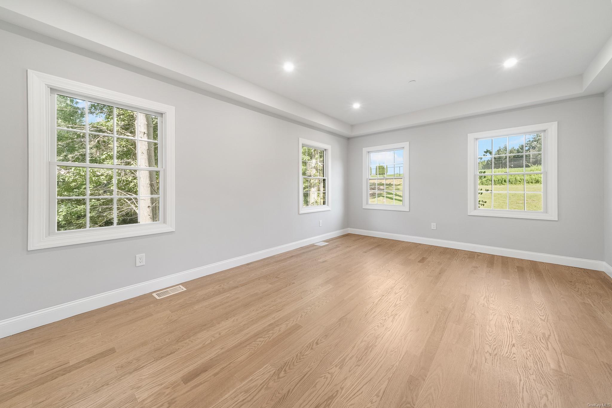 47 Laurel Lane Locust Valley, NY 11560 - Photo 28 of 39 Empty room with light hardwood / wood-style floors