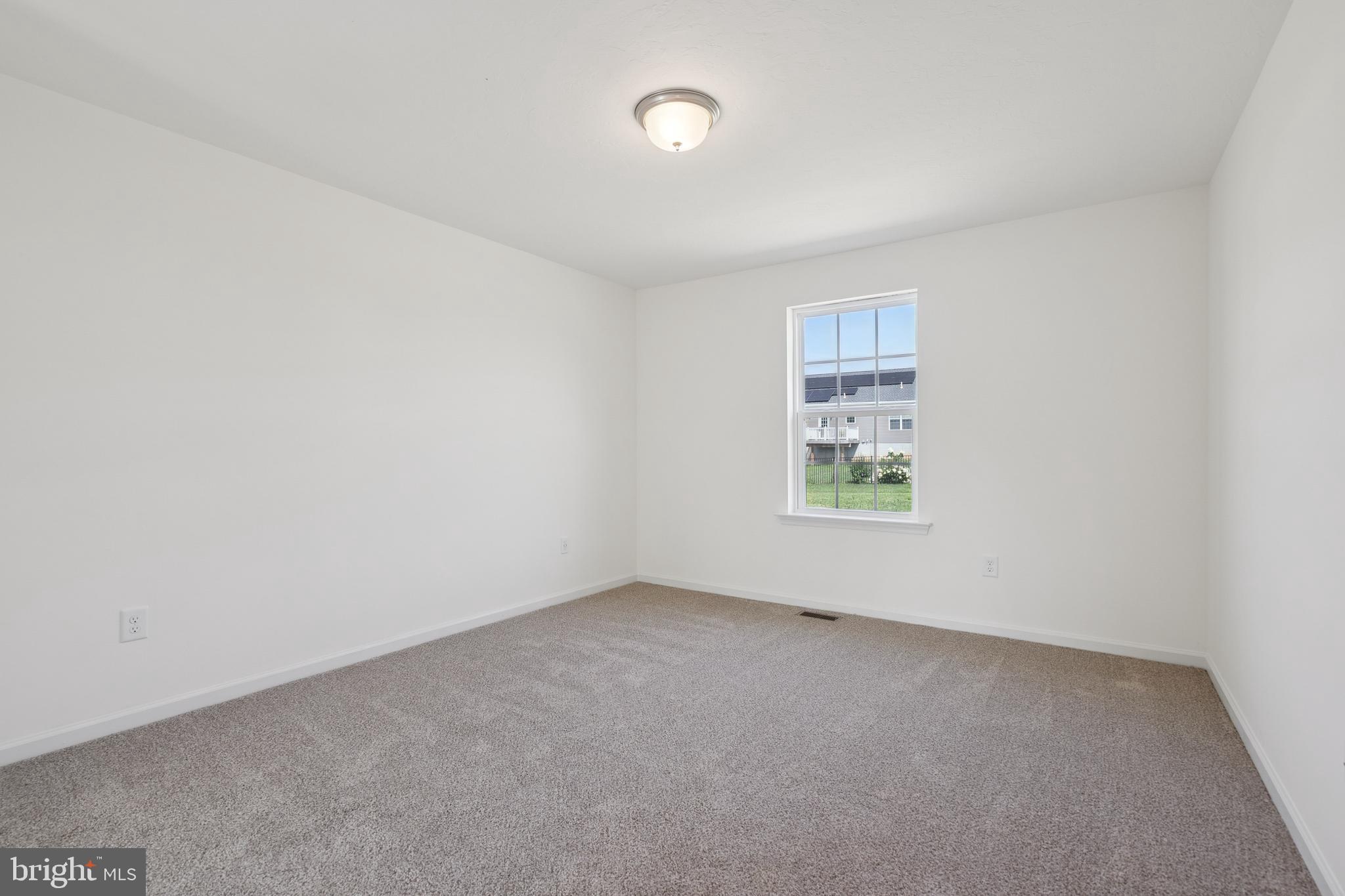 625 Ripple Drive, Unit 187 Hanover, PA 17331 - Photo 11 of 20 an empty room with a window