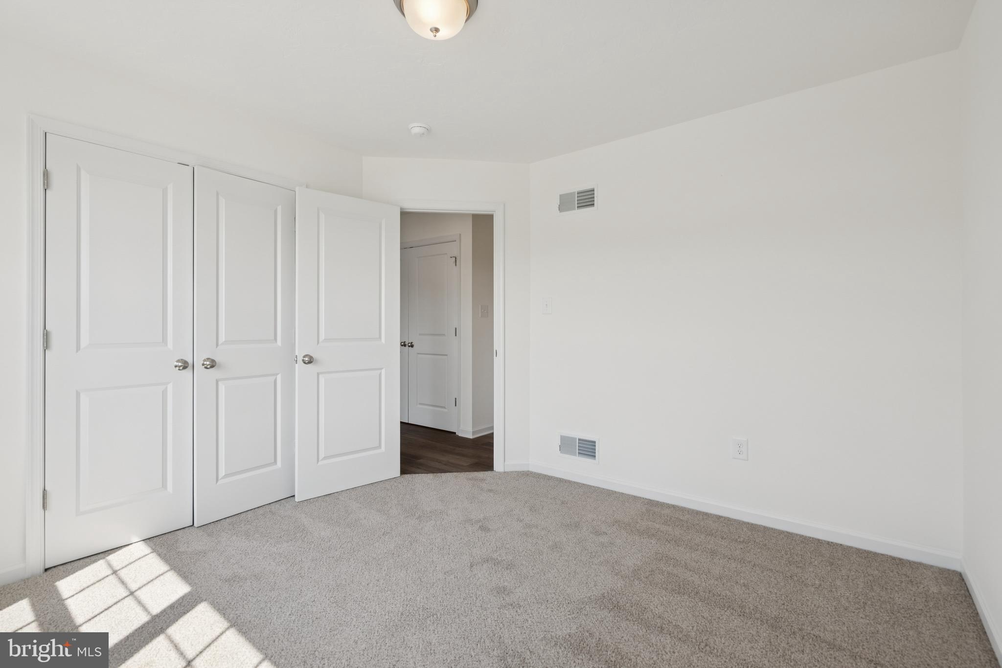 625 Ripple Drive, Unit 187 Hanover, PA 17331 - Photo 18 of 20 a view of an empty room and window