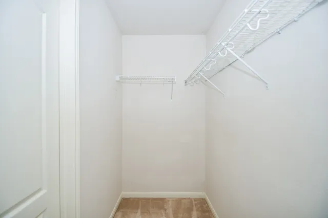 a view of a room with racks on the wall