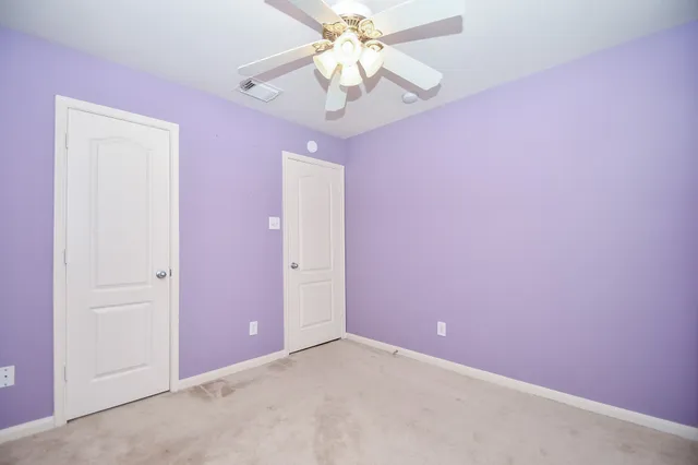 a view of small space with racks on the wall