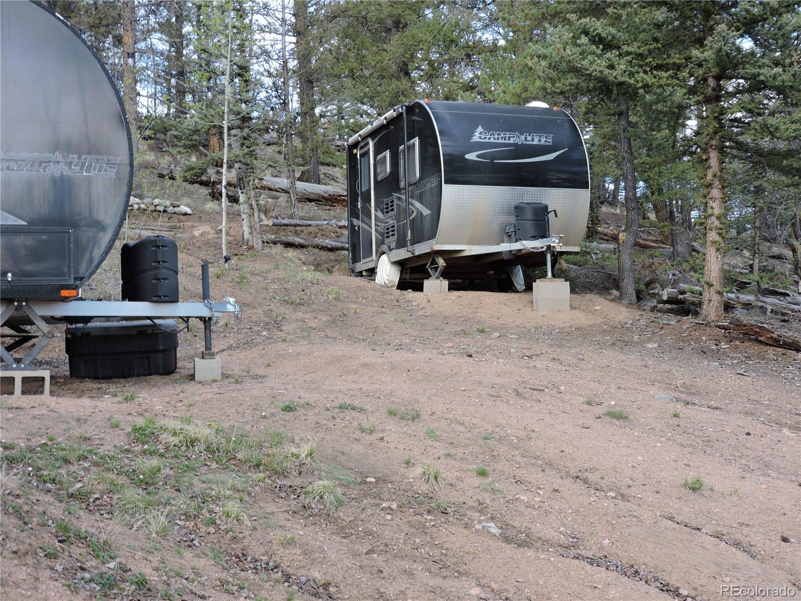 258 Old Squaw Road Como, CO 80432 - Photo 26 of 36 a view of backyard with outdoor kitchen