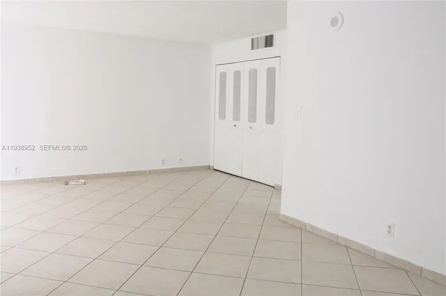 a kitchen with stainless steel appliances a stove microwave and sink