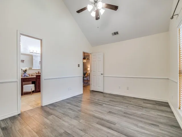 a view of a livingroom with wooden floor