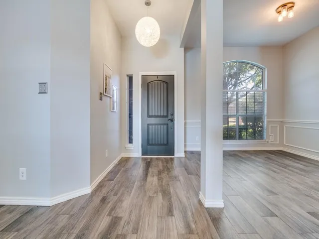 a view of livingroom with hardwood floor and window