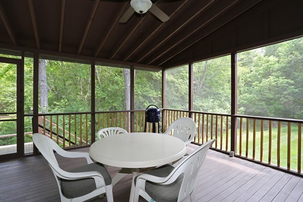 88 Warren Road Sudbury, MA 01776 - Photo 15 of 16 a view of a balcony with chairs and wooden floor