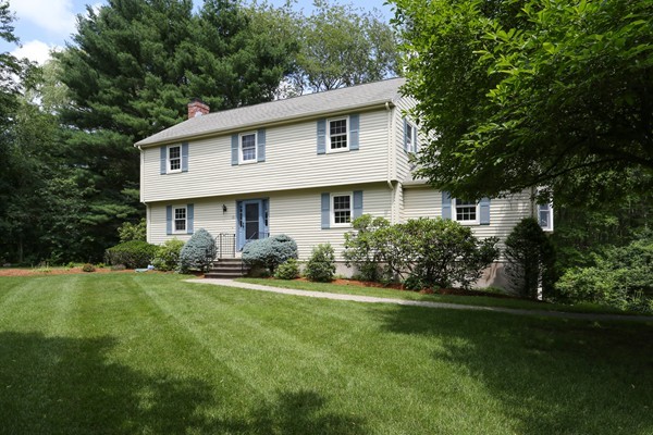 88 Warren Road Sudbury, MA 01776 - Photo 2 of 16 a front view of a house with a yard