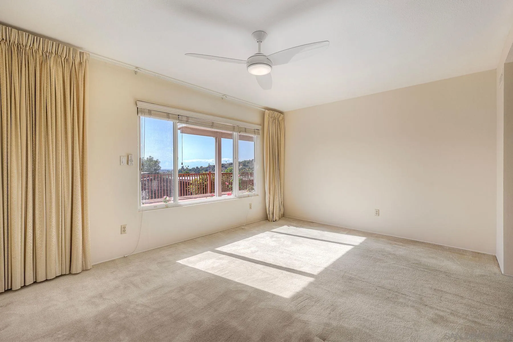 3063 Conner Way San Diego, CA 92117 - Photo 22 of 52 an empty room with windows