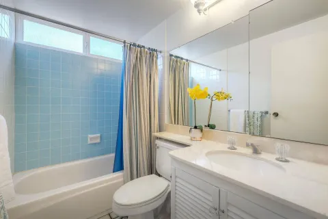 a view of a livingroom with washer and dryer