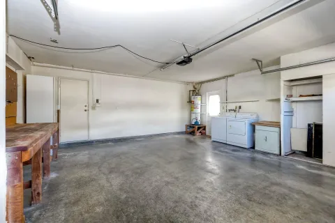 a view of a balcony with wooden fence