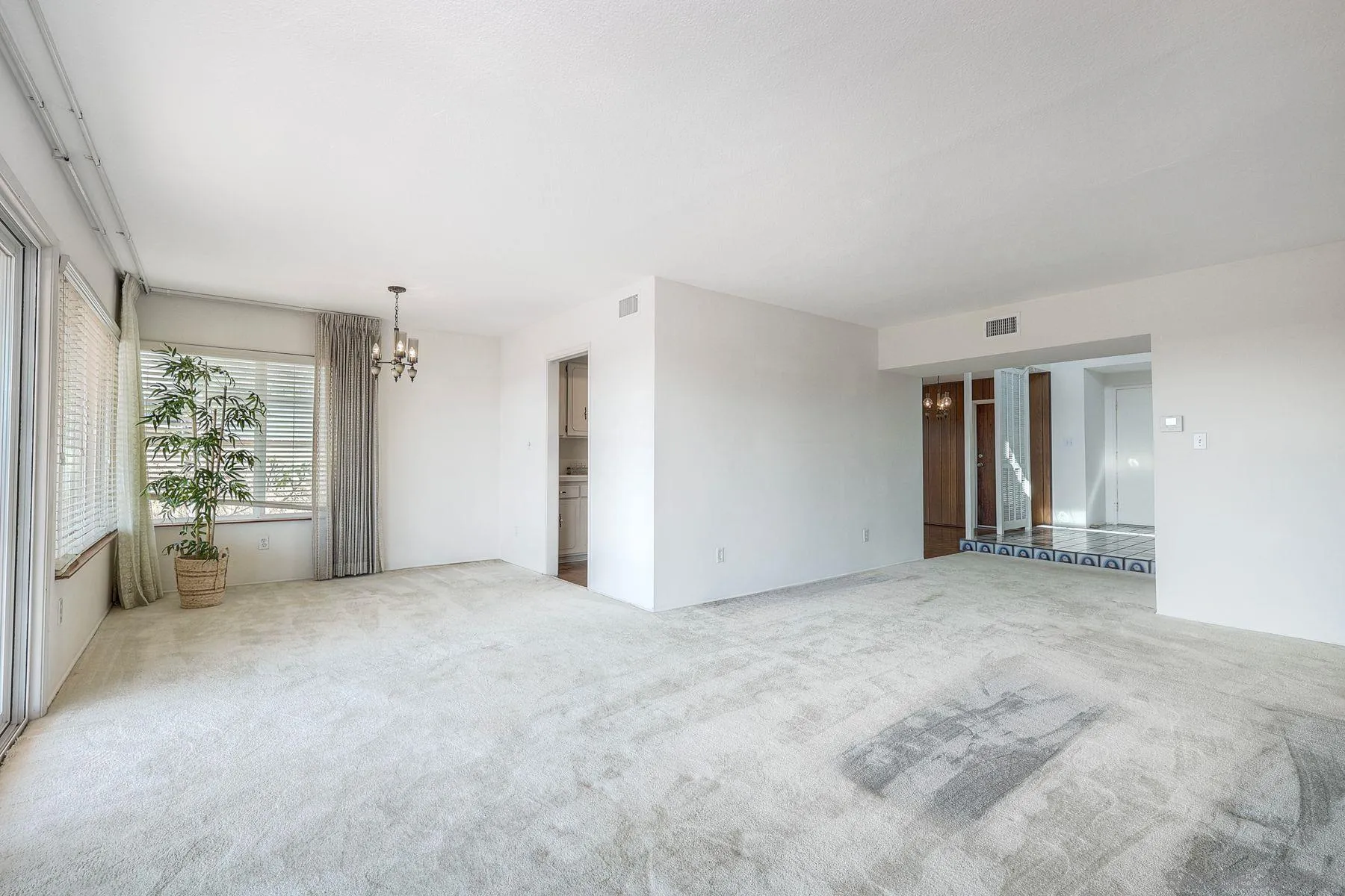 3063 Conner Way San Diego, CA 92117 - Photo 6 of 52 an empty room with windows and closet