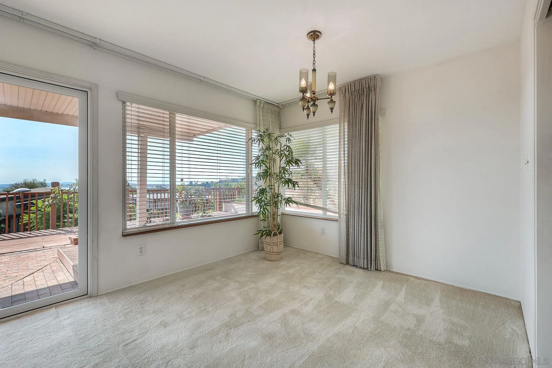 3063 Conner Way San Diego, CA 92117 - Photo 7 of 52 a view of a room with large windows