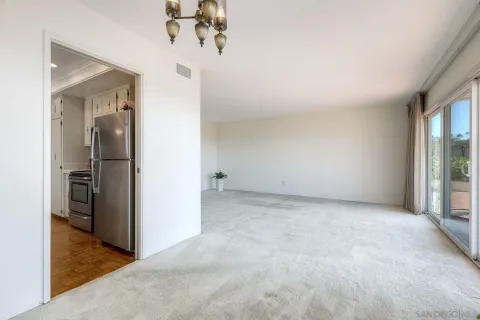 a spacious bathroom with a shower and a sink