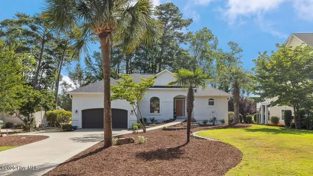 $569,900 | 938 Oyster Pointe Drive, Sunset Beach, NC 28468