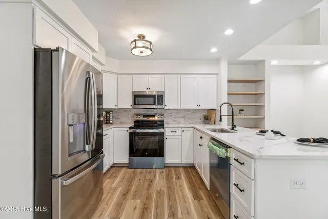 $549,000 | 938 Oyster Pointe Drive, Sunset Beach, NC 28468