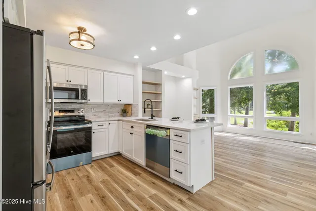 $549,000 | 938 Oyster Pointe Drive, Sunset Beach, NC 28468