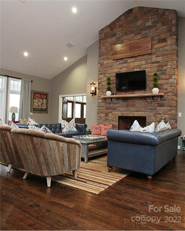 6549 Gopher Road, Unit 354 Lancaster, SC 29720 - Photo 8 of 8 a living room with furniture and a fireplace