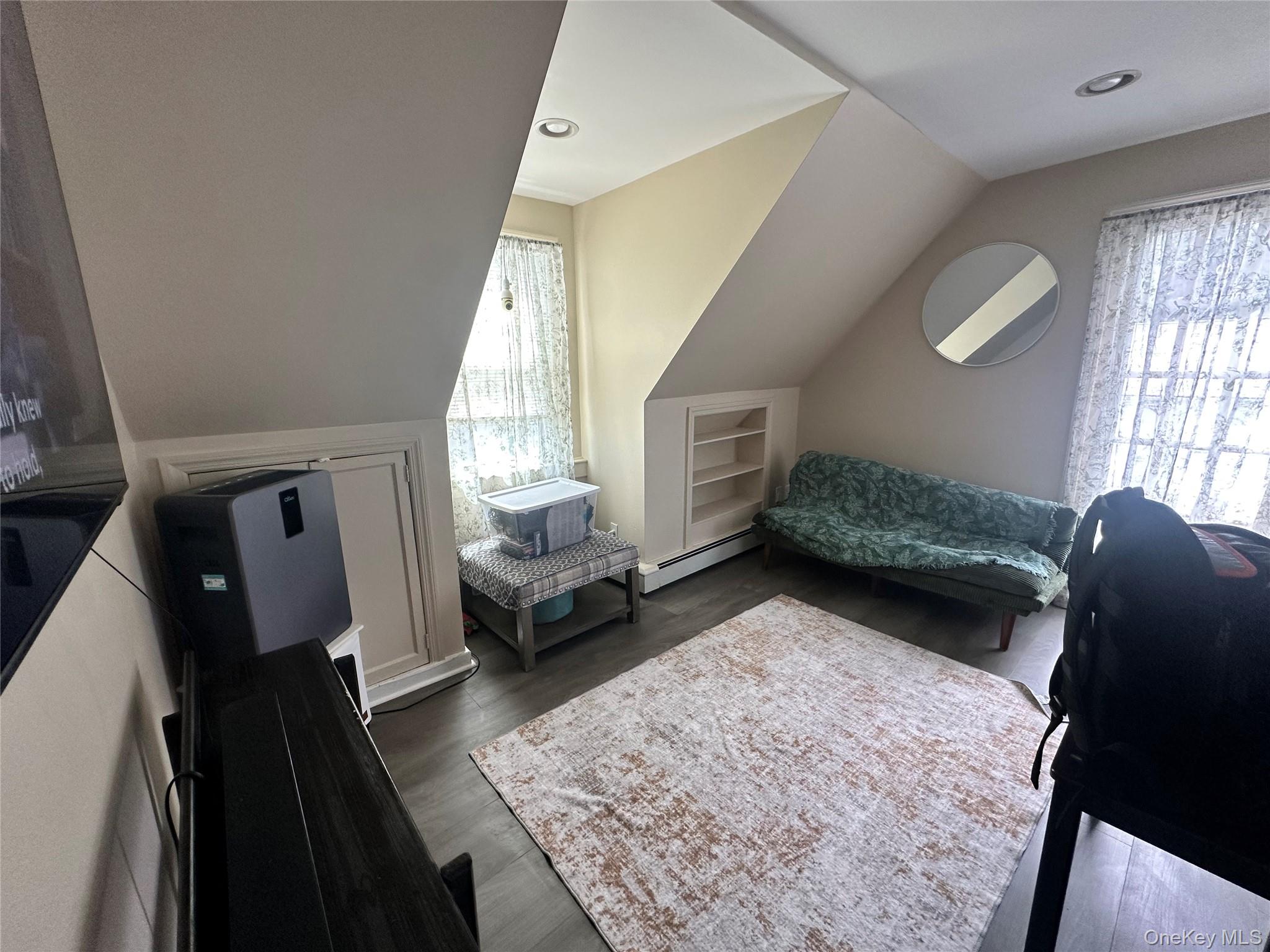 90 Orchard Road, Unit 2 Mahopac, NY 10541 - Photo 4 of 7 a living room with furniture and a rug