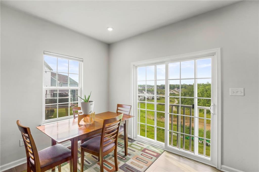 327 Crossing Drive Eighty Four, PA 15330 - Photo 13 of 34 a view of a room that has a table and chairs in it