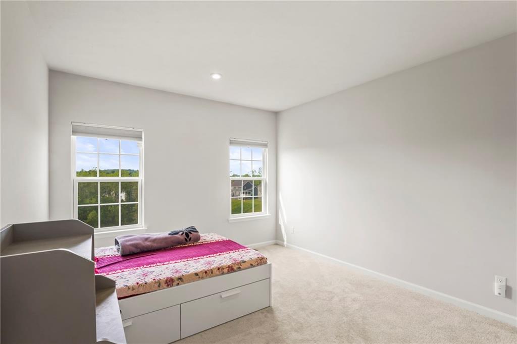 327 Crossing Drive Eighty Four, PA 15330 - Photo 18 of 34 a living room with furniture and windows