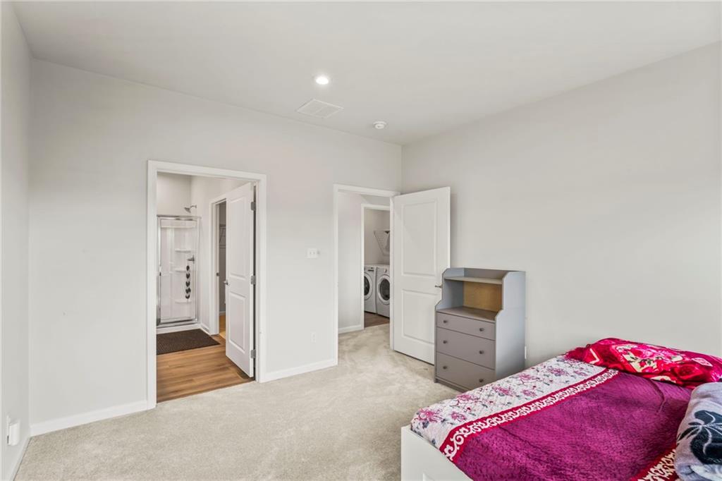 327 Crossing Drive Eighty Four, PA 15330 - Photo 19 of 34 a bedroom with a bed and a cabinets
