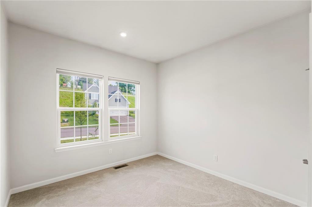 327 Crossing Drive Eighty Four, PA 15330 - Photo 22 of 34 an empty room with a window