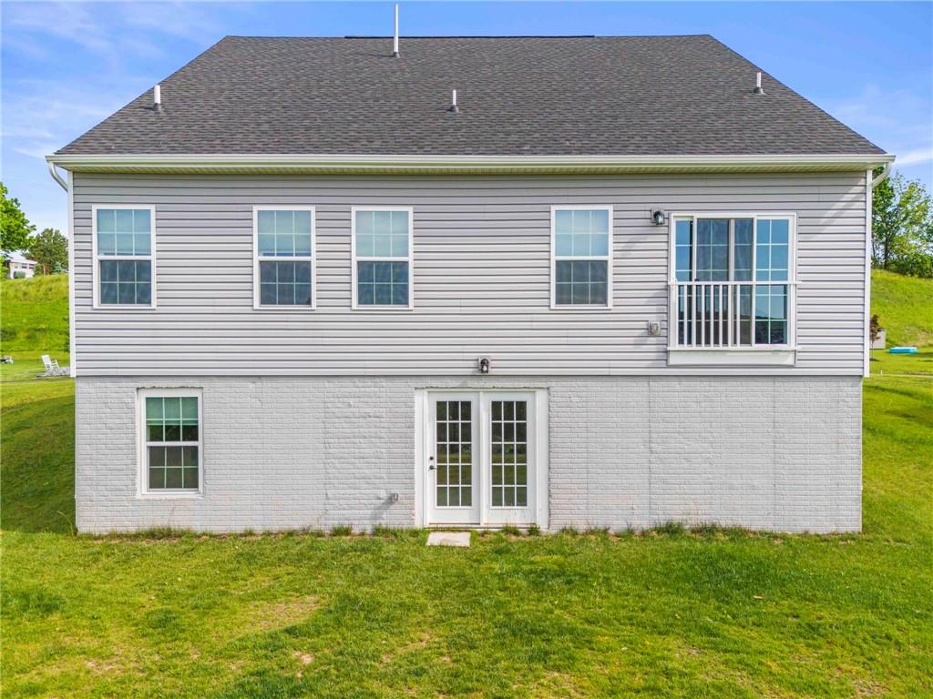 327 Crossing Drive Eighty Four, PA 15330 - Photo 30 of 34 a house that has a big yard in front of it