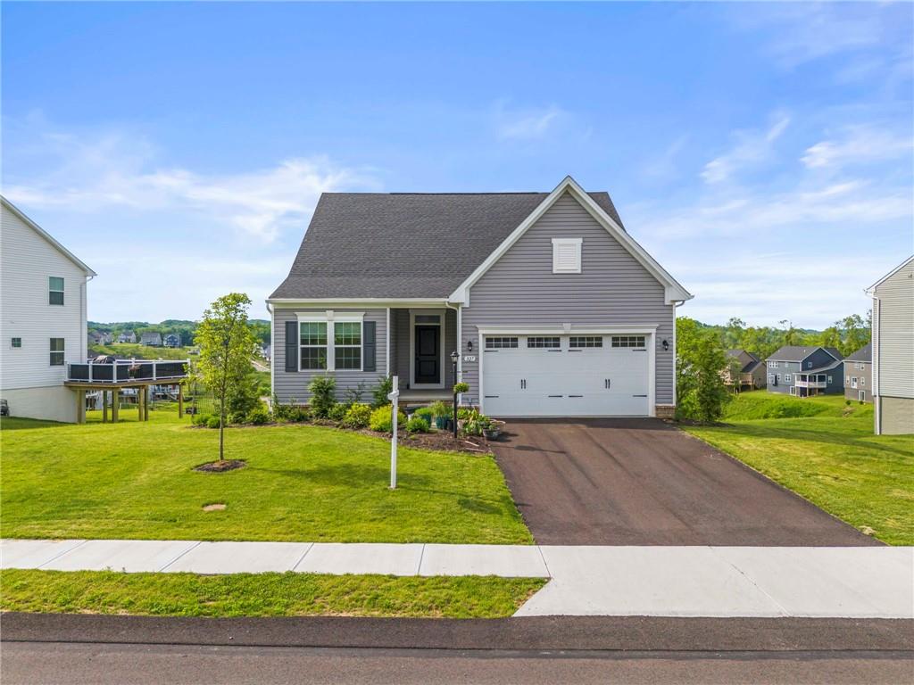 327 Crossing Drive Eighty Four, PA 15330 - Photo 5 of 34 a front view of a house with a yard