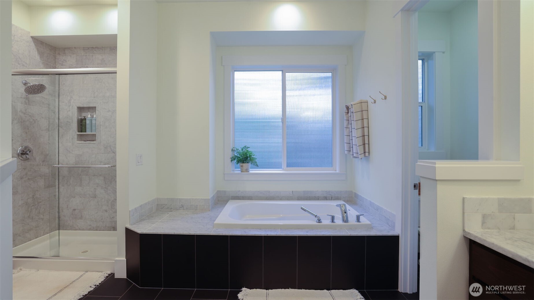 629 Field Place Northeast Renton, WA 98059 - Photo 22 of 37 a bathroom with a sink and a mirror