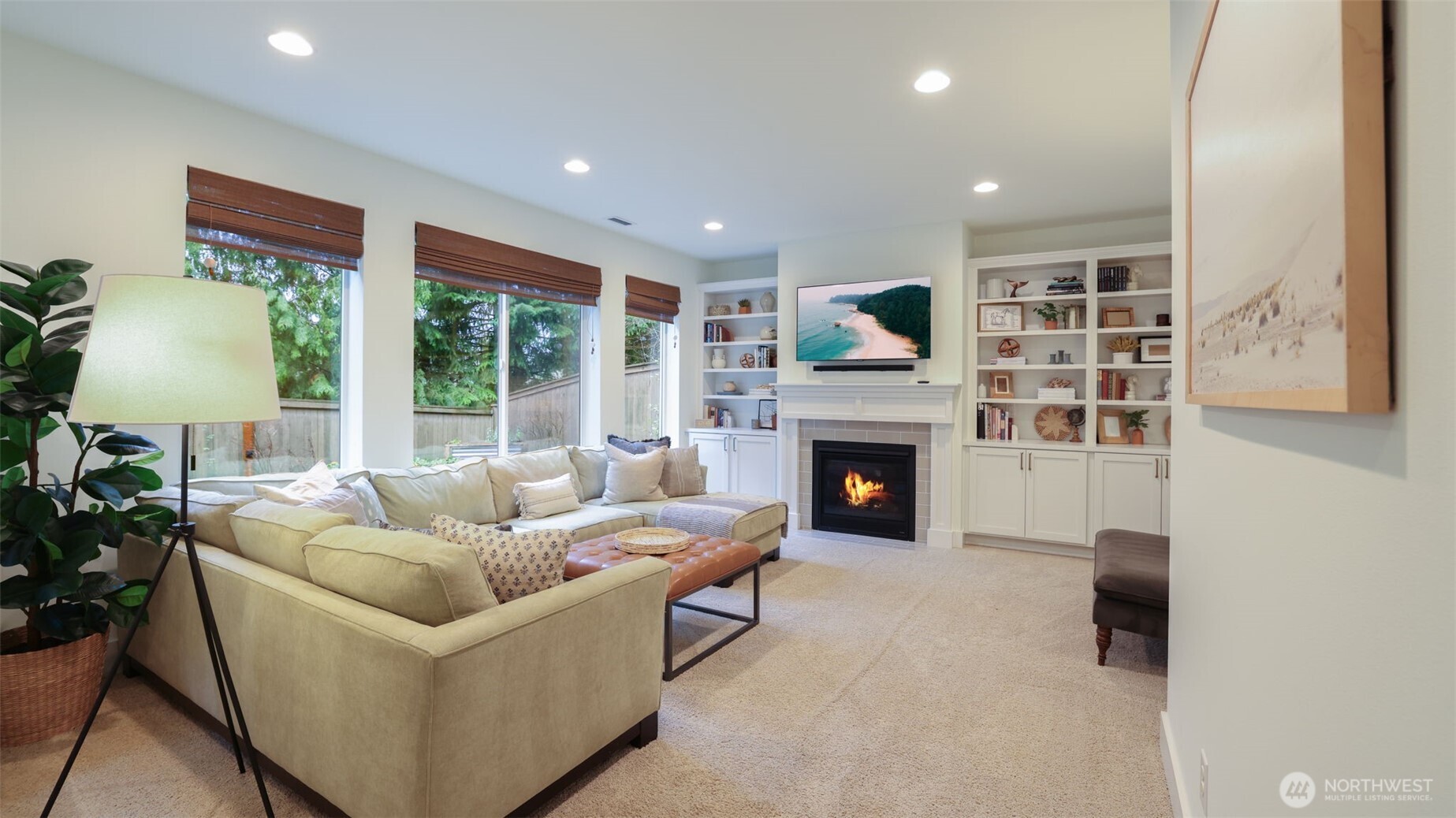 629 Field Place Northeast Renton, WA 98059 - Photo 26 of 37 a living room with furniture and a fireplace