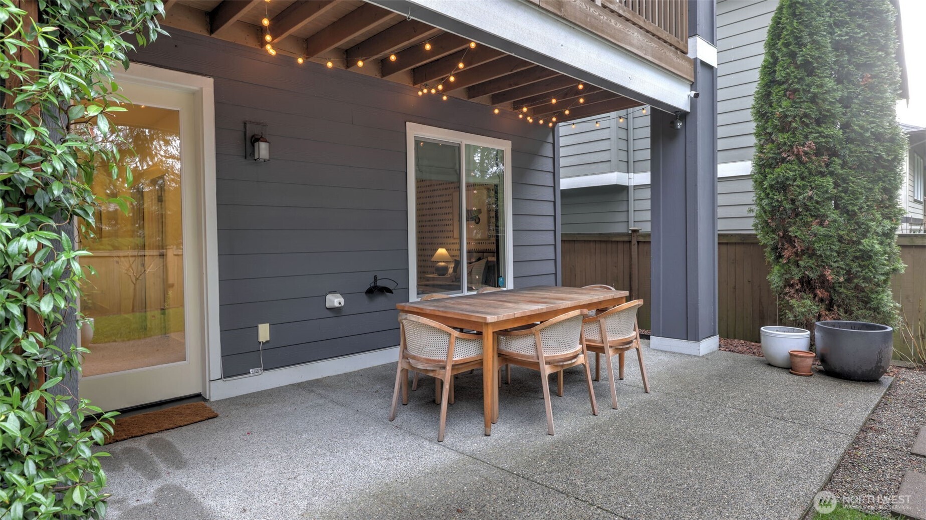 629 Field Place Northeast Renton, WA 98059 - Photo 34 of 37 a backyard of a house with outdoor seating