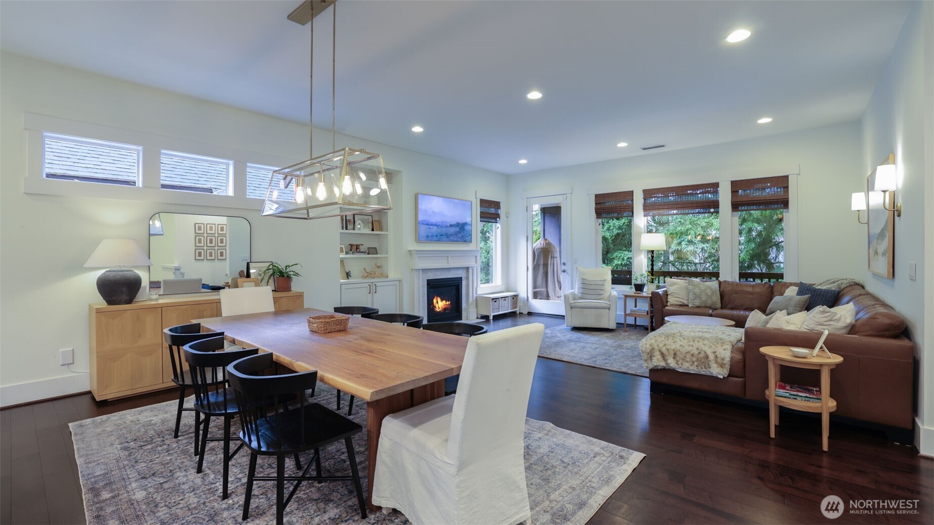 629 Field Place Northeast Renton, WA 98059 - Photo 9 of 37 a living room with fireplace furniture and a chandelier