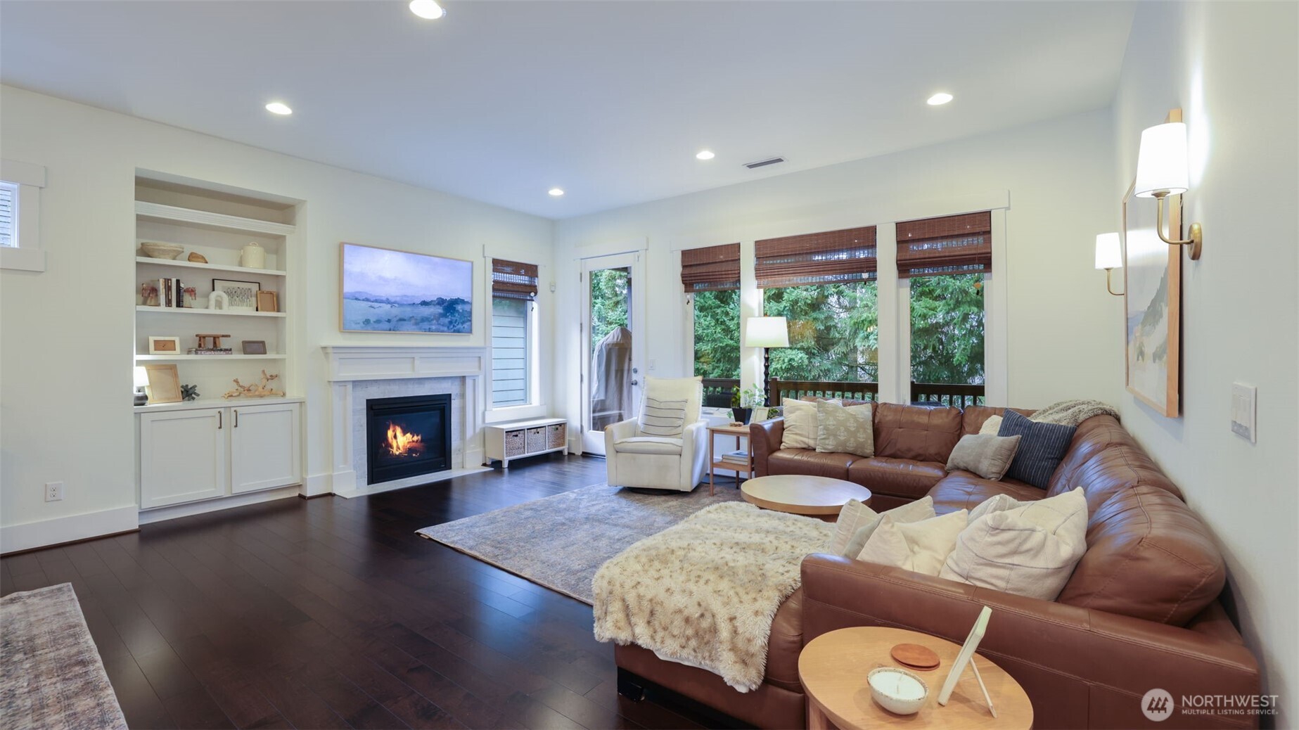 629 Field Place Northeast Renton, WA 98059 - Photo 10 of 37 a living room with furniture and a fireplace
