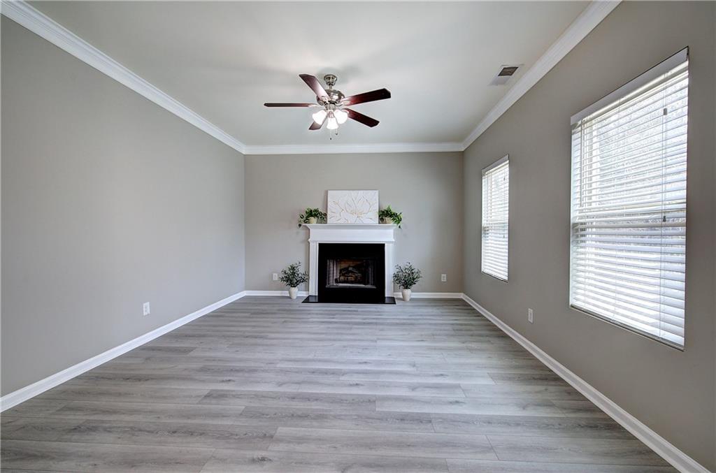 4 Timberland Trace Court Dallas, GA 30157 - Photo 12 of 53 a view of an empty room with window and fire place