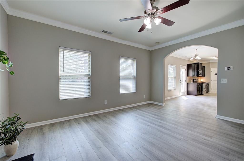 4 Timberland Trace Court Dallas, GA 30157 - Photo 14 of 53 a view of empty room with wooden floor and fan