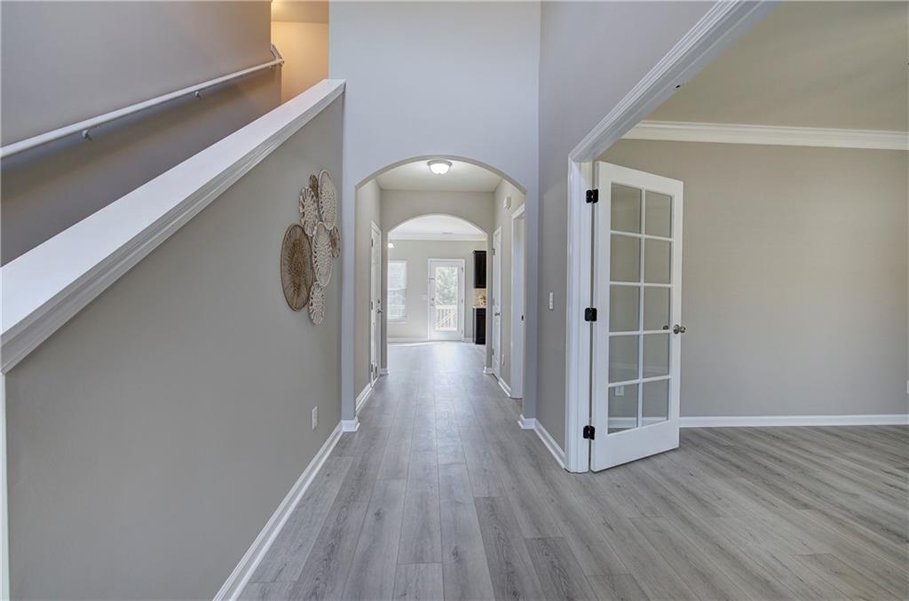 4 Timberland Trace Court Dallas, GA 30157 - Photo 17 of 53 a view of a hallway with wooden floor and staircase