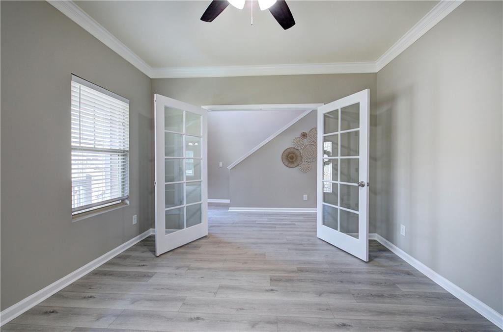 4 Timberland Trace Court Dallas, GA 30157 - Photo 20 of 53 an empty room with wooden floor and window
