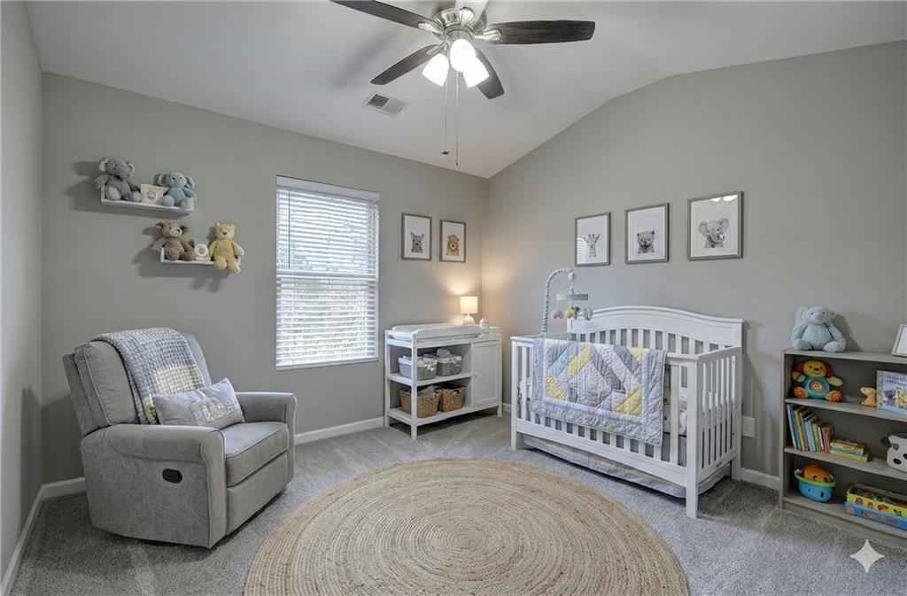 4 Timberland Trace Court Dallas, GA 30157 - Photo 34 of 53 a bedroom with a bed and a couch