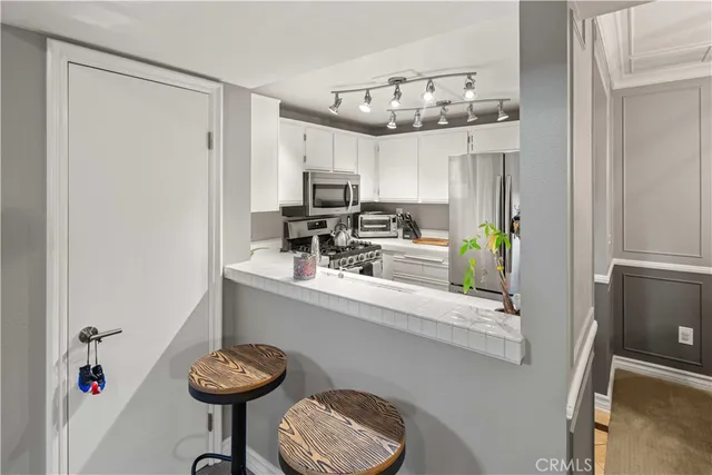 a bedroom with furniture fireplace and window