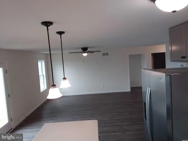 a view of a livingroom with a staircase