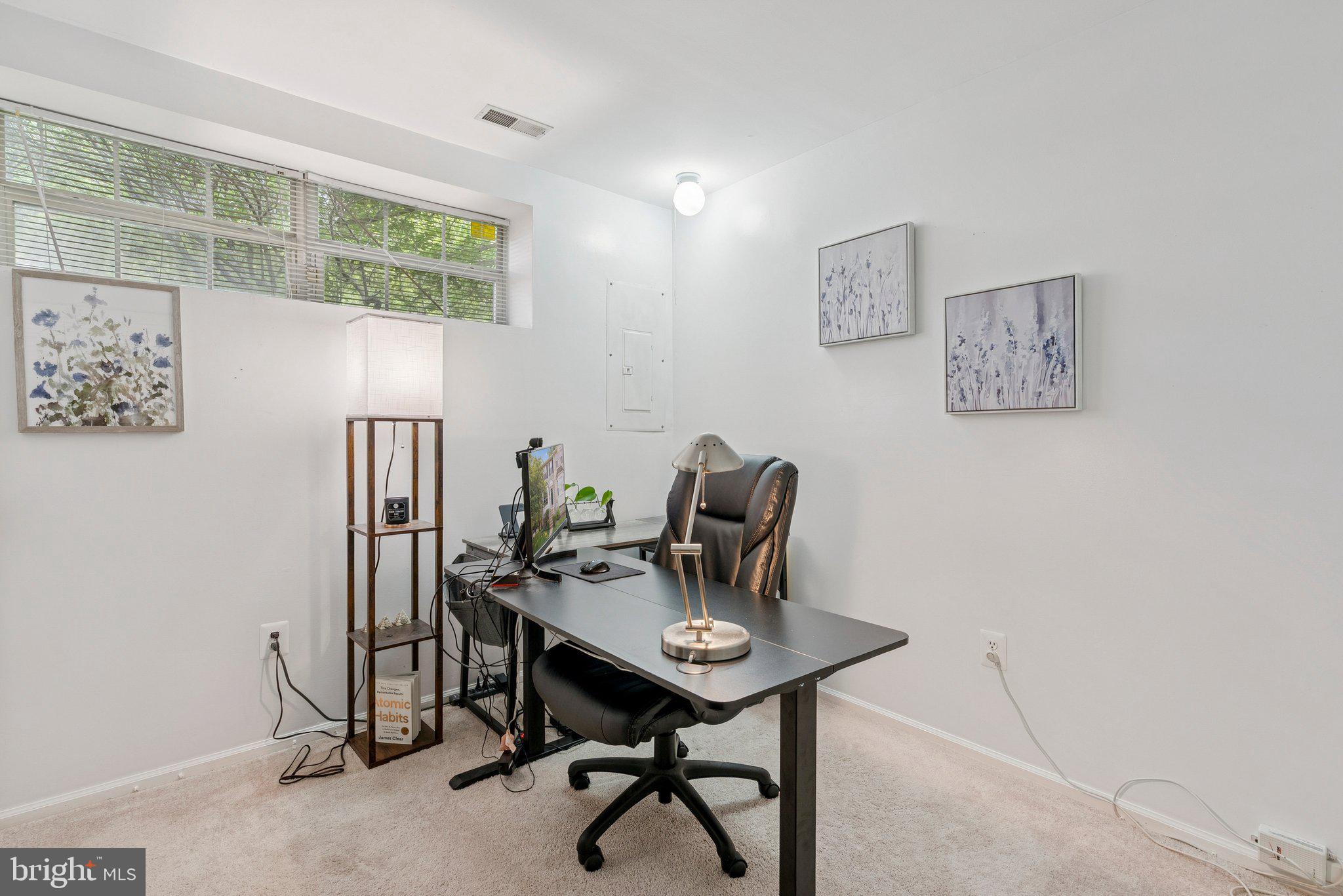 3559 Orchard Shade Road Randallstown, MD 21133 - Photo 13 of 18 a view of a workspace with furniture