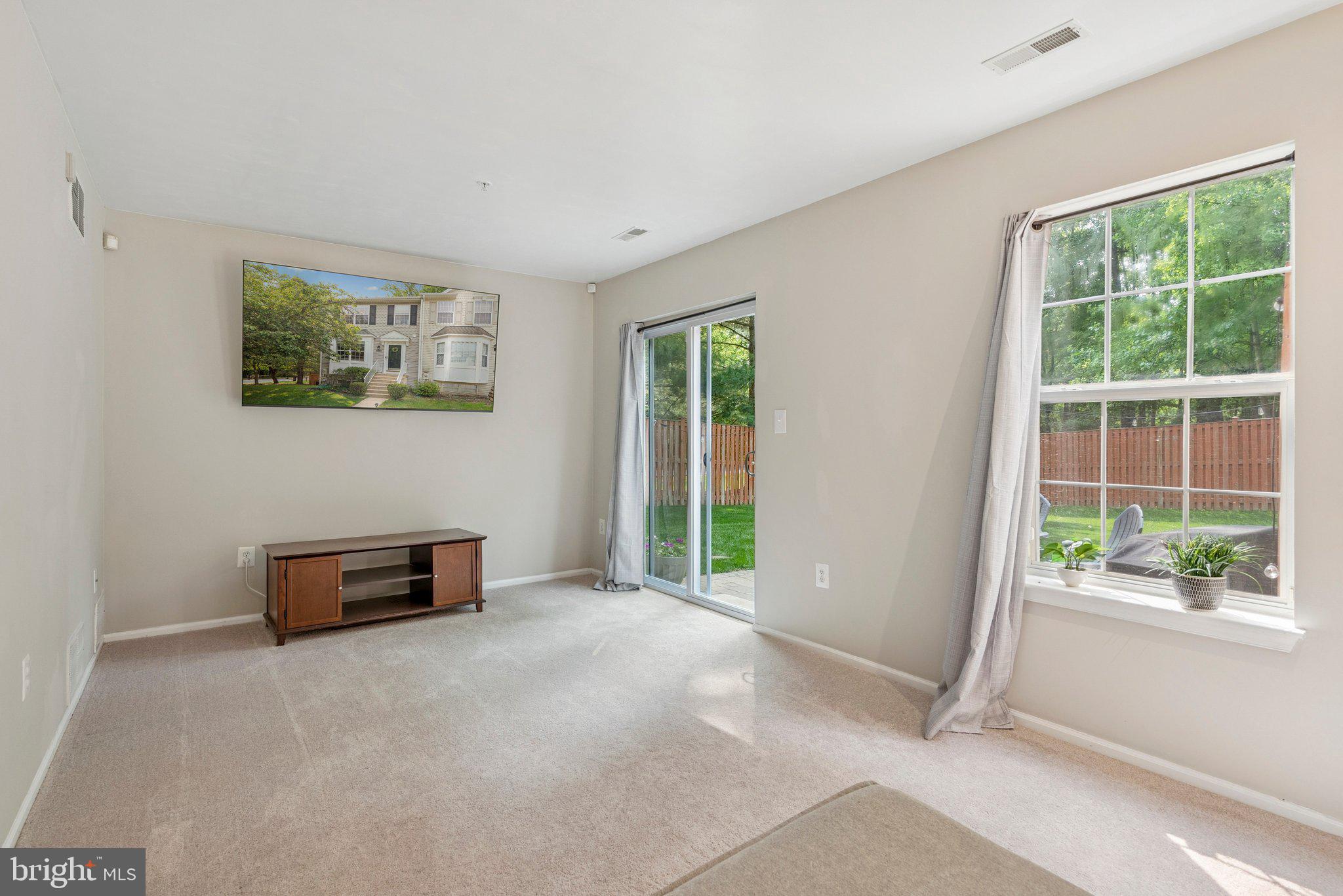 3559 Orchard Shade Road Randallstown, MD 21133 - Photo 14 of 18 a view of an empty room with a window